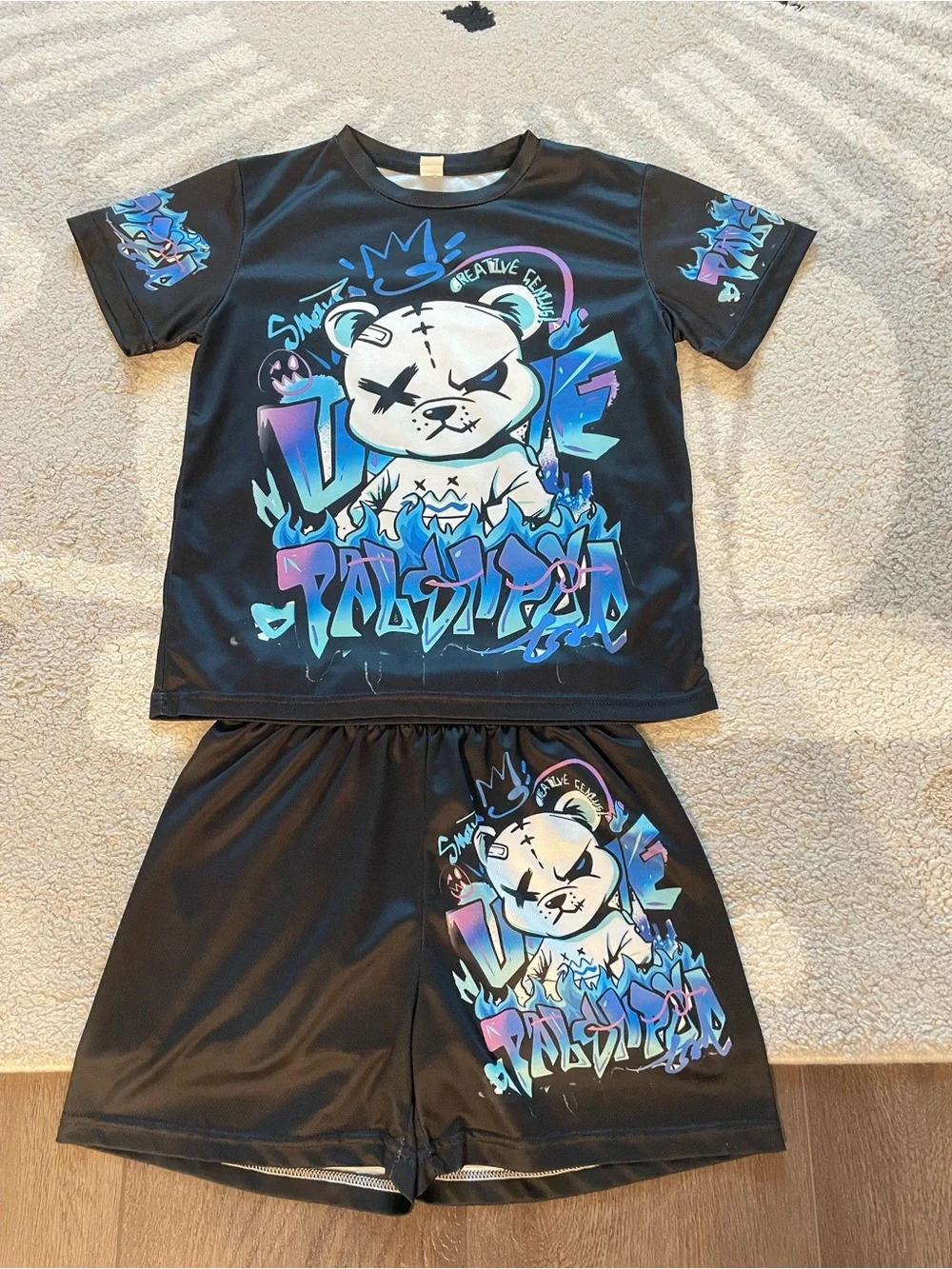 Kids Black Pajama Set with Blue & Purple Graphic Bear